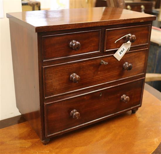 A mahogany miniature chest of drawers W.42cm